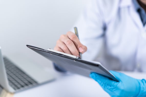A doctor with an iPad